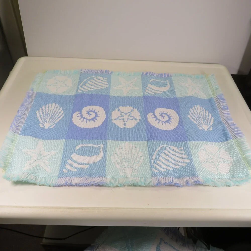 Sea Shell woven placemats w fringe  (soft) 20x14